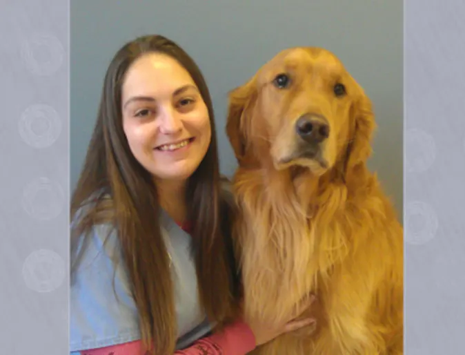 Staff and dog at Gentle Animal Hospital